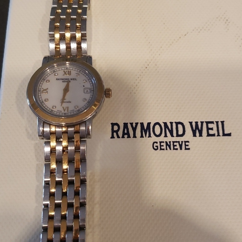 Raymond  Weil Toccata woman's watch with pearl face and Diamond accents.